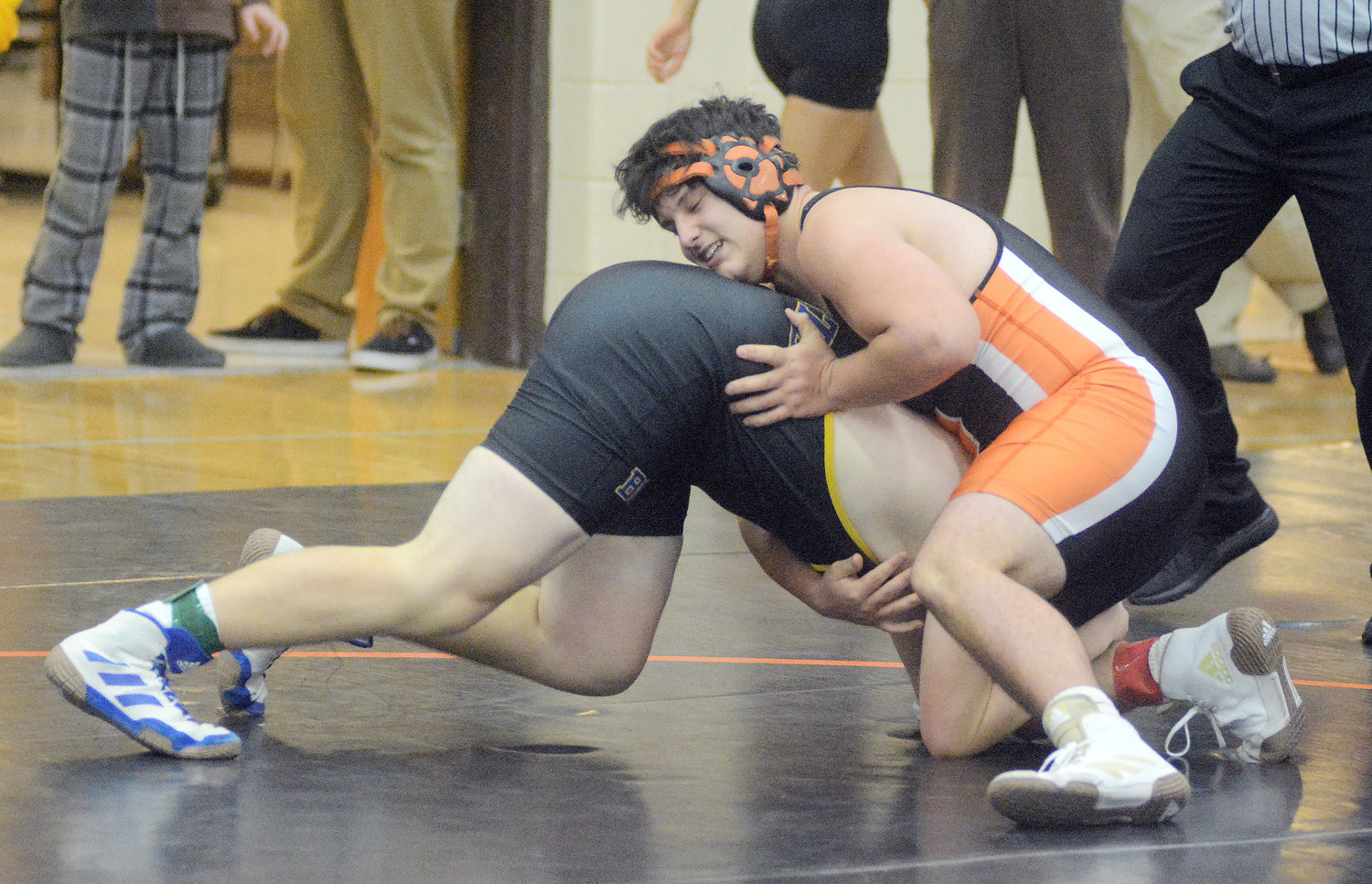 Logan Bailey wrestles against St. Francis Borgia’s Will Clarkson in the 195A pound weight class for Owensville during their annual JV Wrestling Tournament held Monday, Dec. 20 prior to Christmas break.